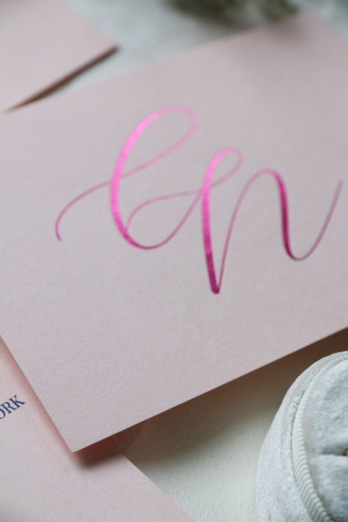 metallic foil RSVP with couple's monogram